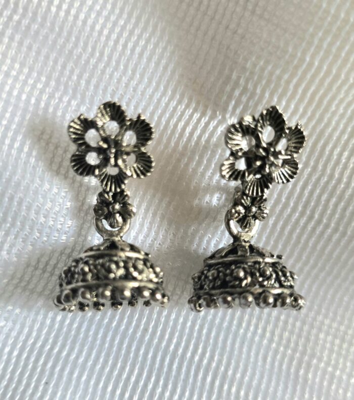 Timeless Oxidized Silver Jhumkas with Floral Detail by Zara Jio - Image 1